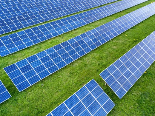Commercial solar array installation in field.