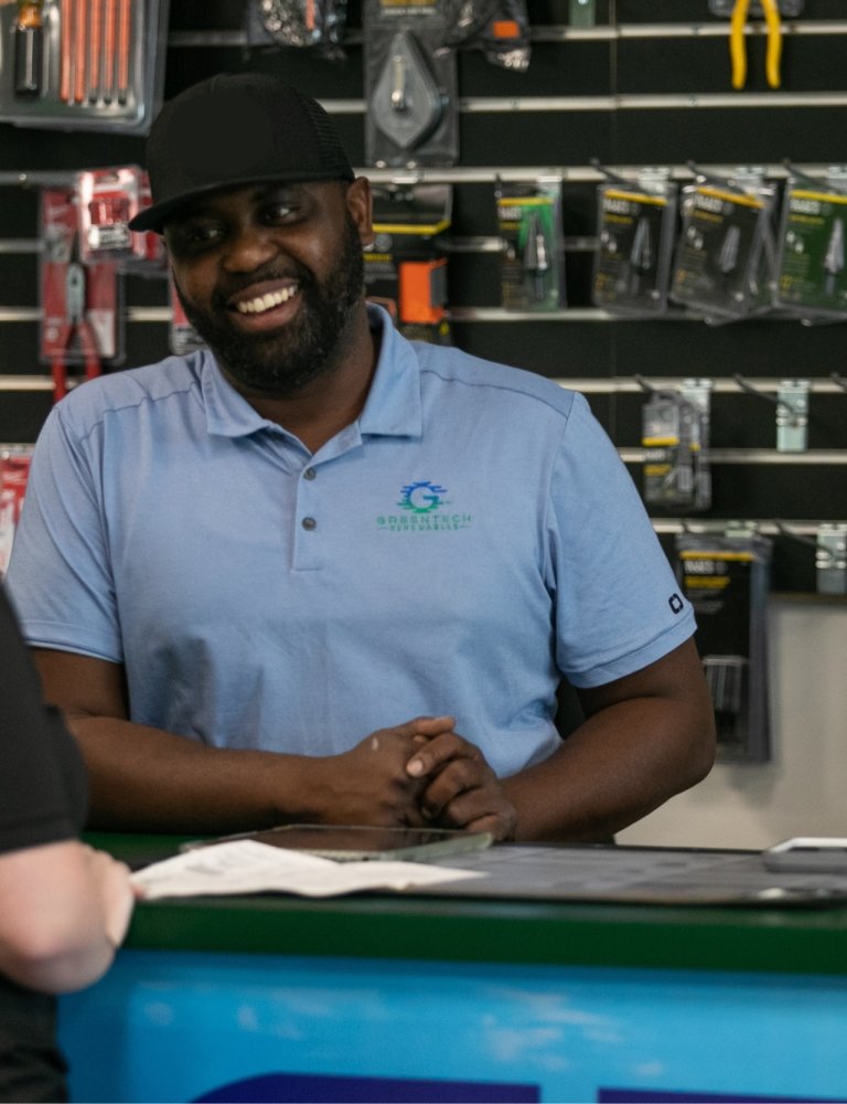 Greentech Renewables employees working customer service.