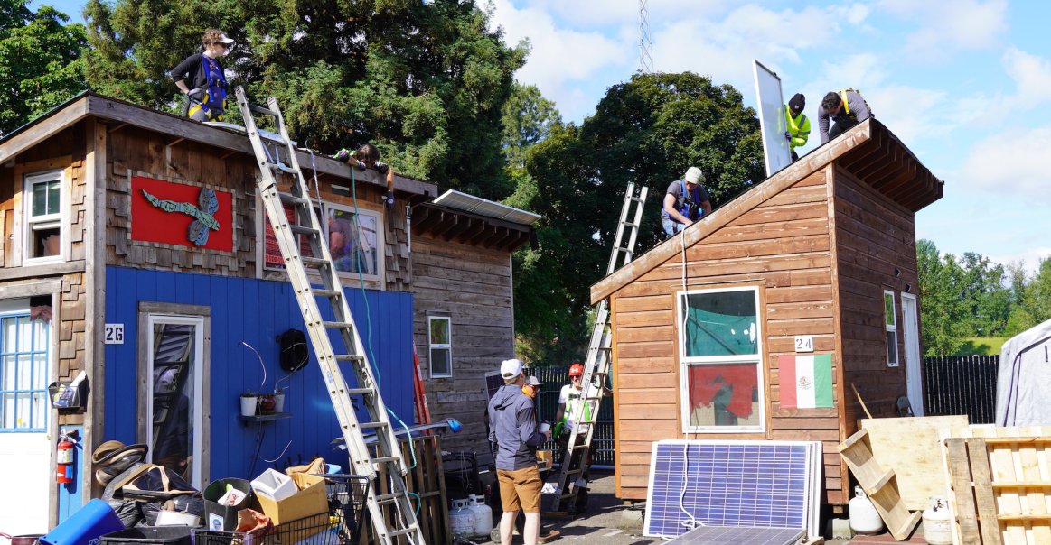 Team Working on Solar Installation Team Working on Solar Installation