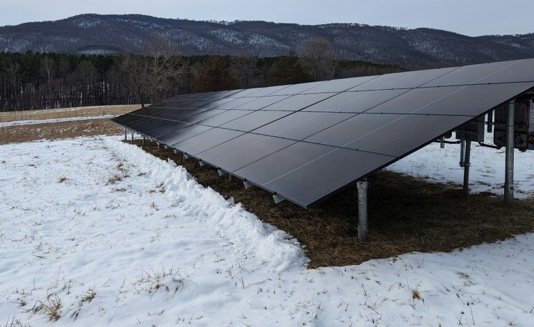 solar farm in the snow in Wisconsin