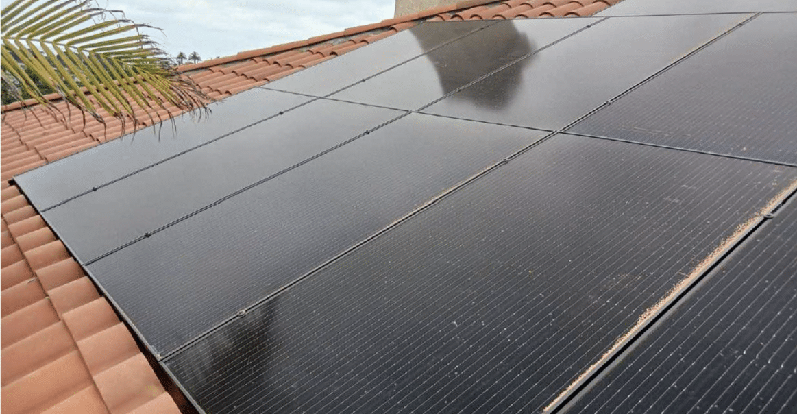Close up of solar panels on residential rooftop. Close up of solar panels on residential rooftop.