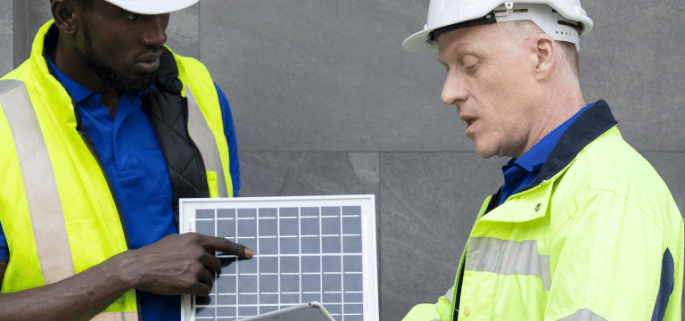 Installers discussing panel designs